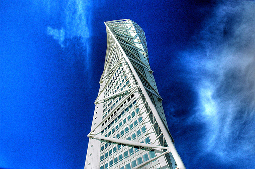 Constructing tables is an art - maximizing readability and information can be challenging. The image is of the Turning Torso in Malmö and is CC by Alan Lam.